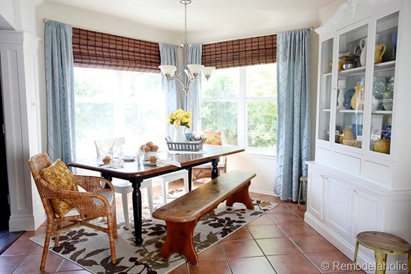 Dining Room updates bamboo shades-bench-wicker chairs white hutch blue and yellow (2)