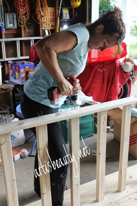 attach support braces to a diy farmhouse table, featured on Remodelaholic.com