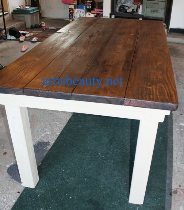 diy farmhouse table with provincial stained top and CeCe Caldwell chalk painted legs, featured on Remodelaholic.com