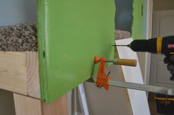 attaching walls to the indoor tree house enclosure, I Am Hardware featured on Remodelaholic