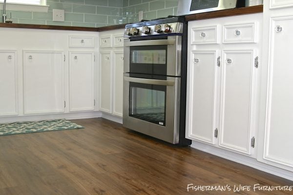 double oven in a white kitchen makeover, Fisherman's Wife Furniture featured on Remodelaholic.com