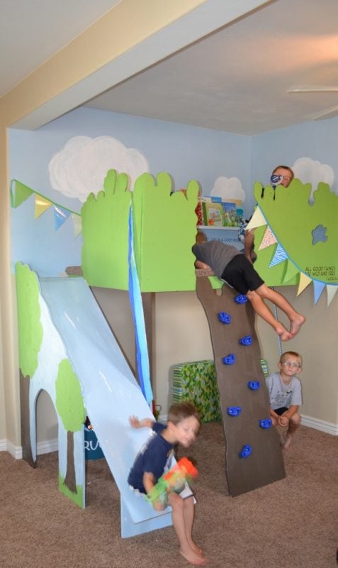 kids playing in the indoor tree house loft, I Am Hardware featured on Remodelaholic