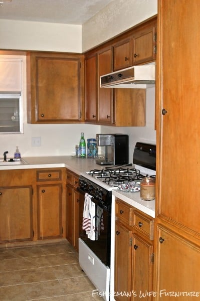 orange kitchen cabinets before the makeover, Fisherman's Wife Furniture featured on Remodelaholic.com