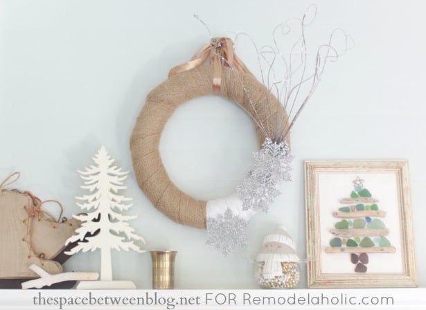 winter wreath with burlap and snowflakes made by thespacebetweenblog.net for Remodelaholic.com
