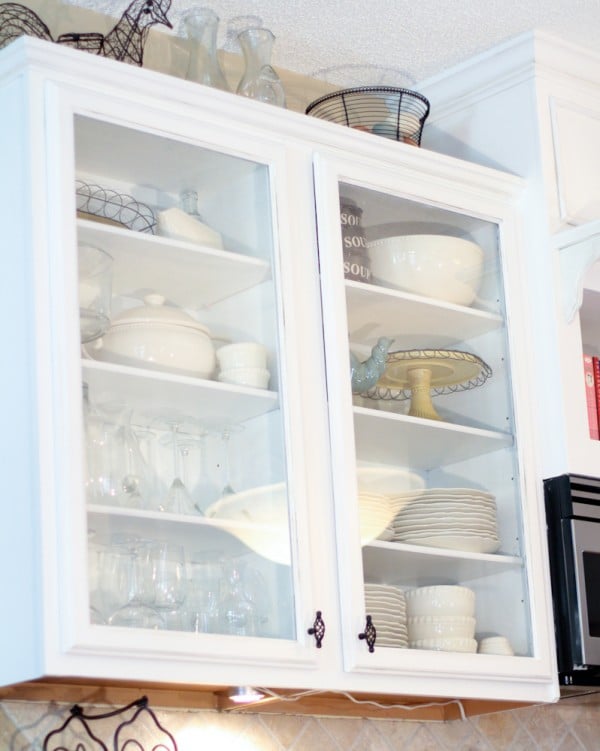 glass front cabinets, Scissors and Spatulas featured on Remodelaholic