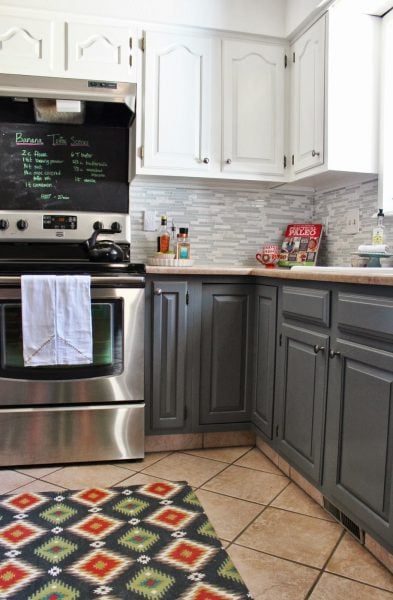 grey and white kitchen makeover with tile backsplash and chalkboard, House For Five featured on Remodelaholic