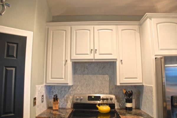 white painted kitchen cabinets, The Rozy Home featured on Remodelaholic
