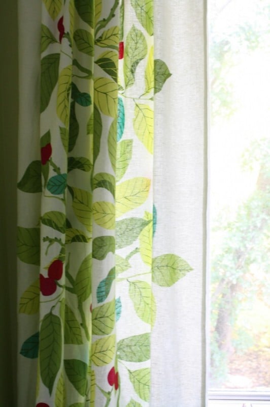 floral ikea curtains for the laundry room, featured on Remodelaholic