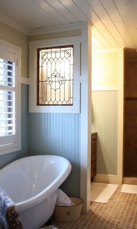 Decorate with a Little Bit - old window in bathroom wall - via Remodelaholic