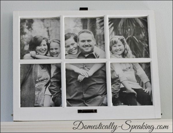 Domestically Speaking - family photo framed in paned window - via Remodelaholic