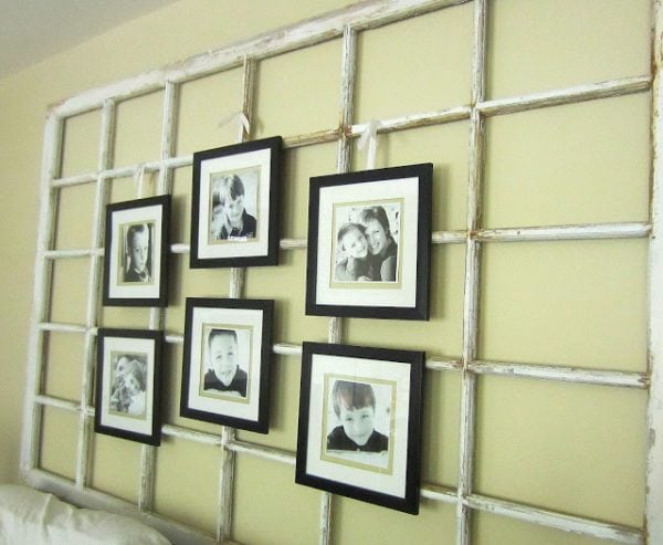 Down to Earth Style - old window photo display - via Remodelaholic
