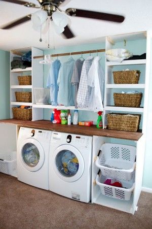 Great sorting space in a laundry area featured on Remodelaholic.com