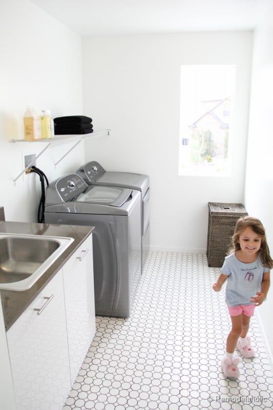 Beautiful light and bright and full of natural light laundry room. Fabulous Laundry room design ideas from @Remodelaholic (56 of 103)