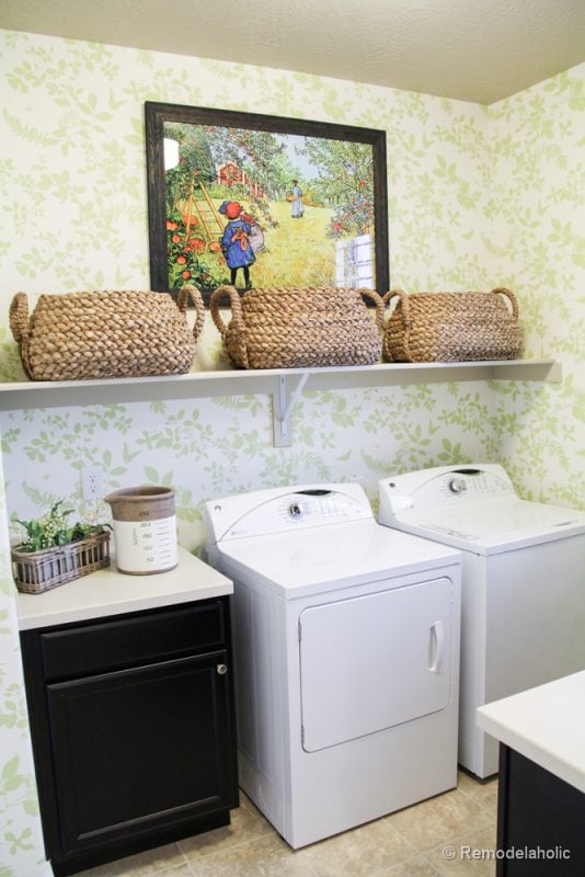 Add shelving for baskets above machines in the laundry room. Fabulous Laundry room design ideas from @Remodelaholic 