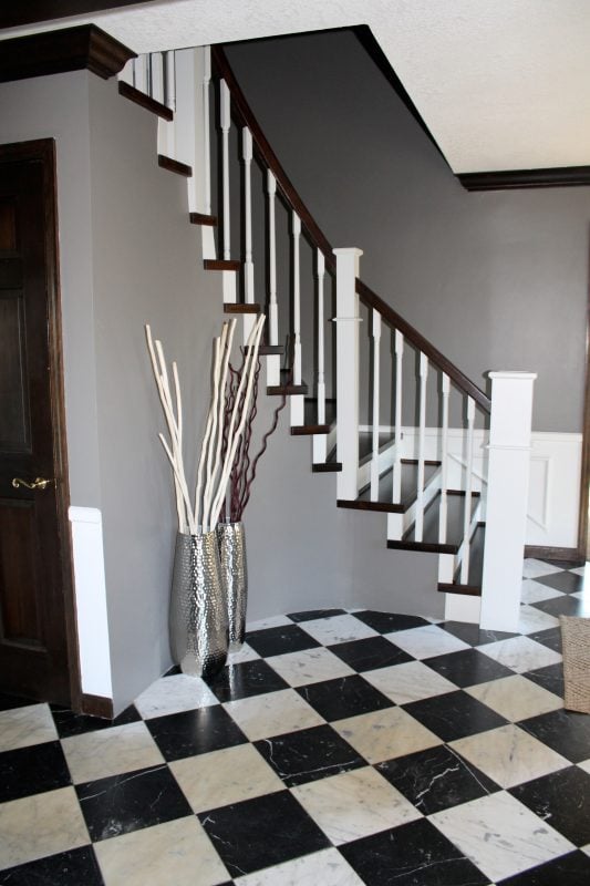 checkered tile floor and diy wood staircase remodel - Construction2Style via @Remodelaholic
